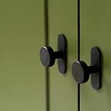 2X Bronze Kilburn Furniture Knobs on Green Cupboard