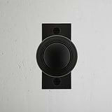 Poplar Short Plate Sprung Door Knob Bronze Finish on White Background right Facing Front View