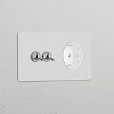 Double toggle switch and Schuko Type F power module in polished nickel white on a Double Sockets & Modules plate.