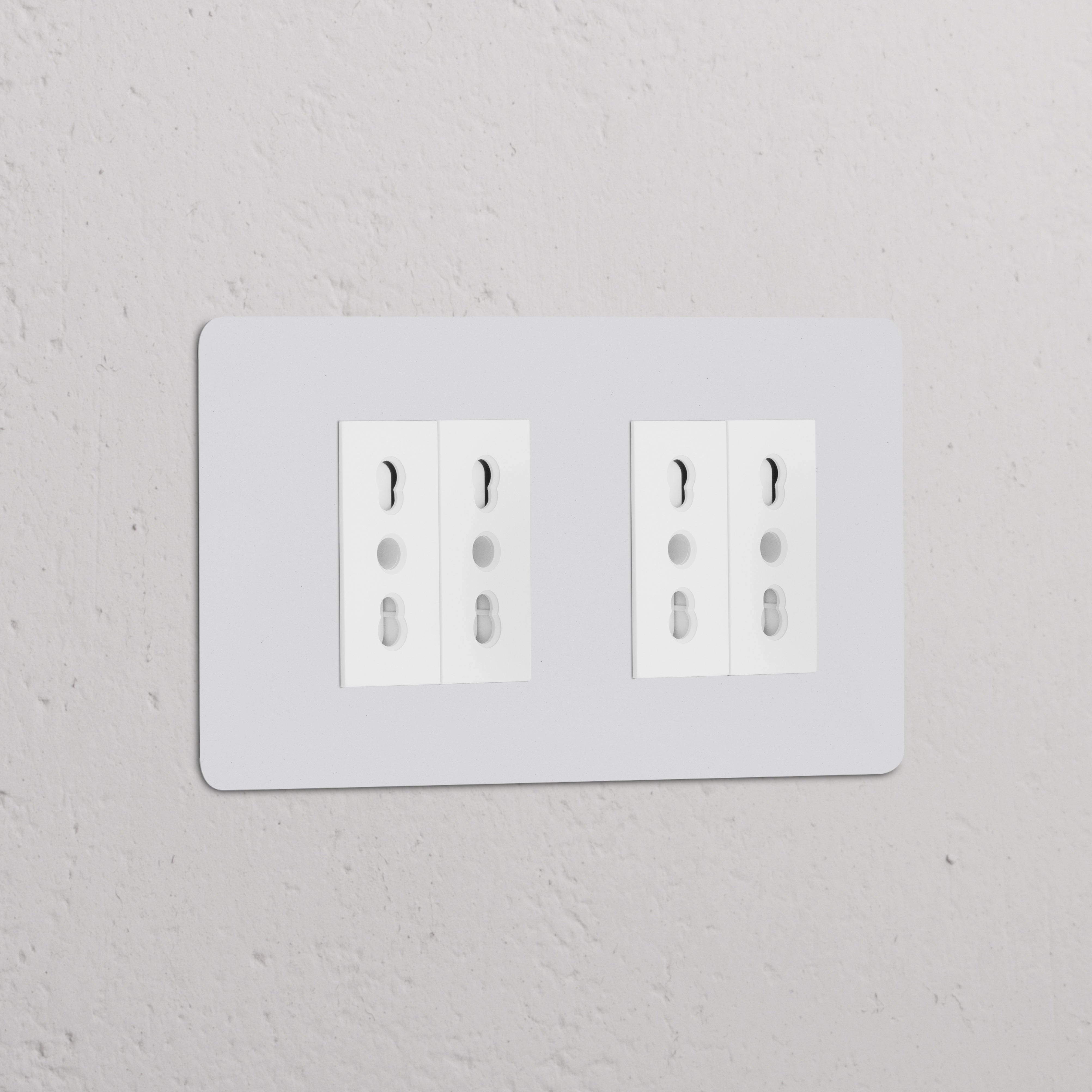 Double 4x Bipasso Power Module, paintable white, featuring a double socket with dual three-hole plug sets.