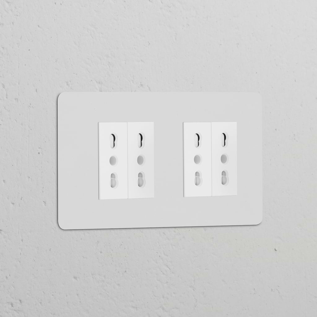 Double 4x Bipasso Power Module, paintable white, featuring a double socket with dual three-hole plug sets.