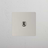 Light Toggle Switch on White Background: Polished Nickel Single Toggle Switch