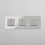 Six-Way Triple Rocker Switch in Clear Polished Nickel White - Advanced Light Management Accessory on White Background