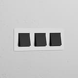 Triple 3x Rocker Switch in Paintable Bronze Black for Triple Switches & Dimmers, enhancing any interior decor.