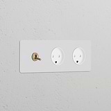 Triple toggle switch with 2 Danish Type K power modules in paintable antique brass white finish for style and function.