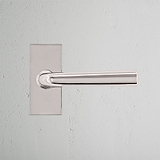 Apsley Short Plate Fixed Door Handle Polished Nickel Finish on White Background Front Facing