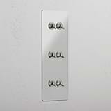 Vertical Six-Position Triple Toggle Switch in Clear Polished Nickel - Comprehensive Lighting System