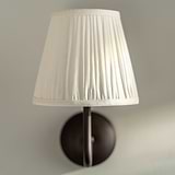 Small Malvern Wall Light in Alabaster White front facing close up of pleated shade 
