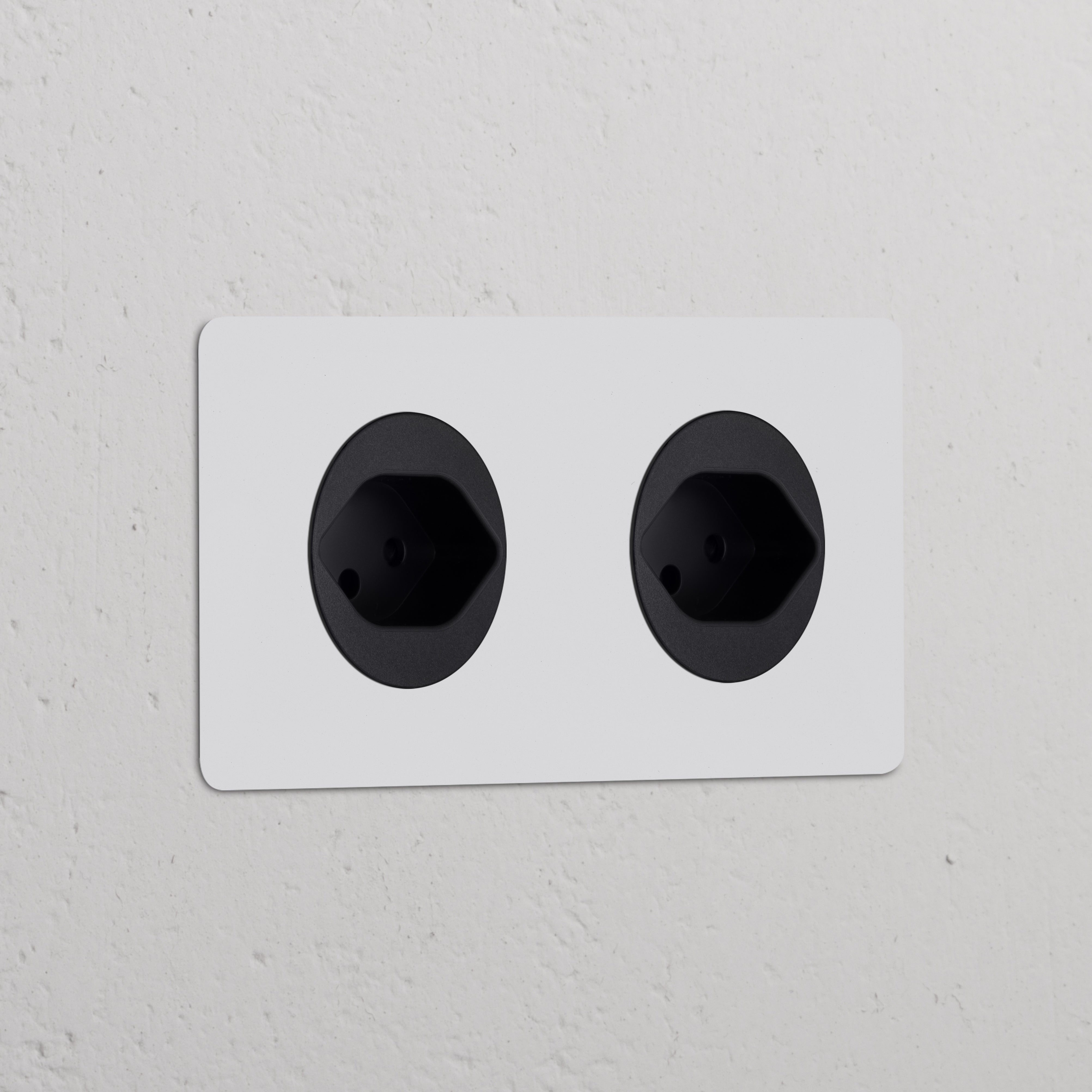 Double 2x Swiss Type J Power Module, black, paintable finish; ideal for seamless integration into any decor.