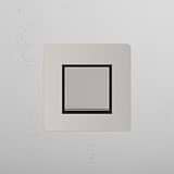 Retractive Light Control Switch on White Background: Polished Nickel Black Single Rocker Switch (Ret)