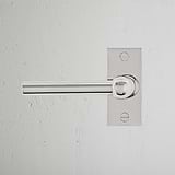 Harper Short Plate Sprung Door Handle Polished Nickel Finish on White Background right Facing Front View