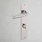 Digby Long Plate Sprung Door Handle & Thumbturn Polished Nickel Finish on White Background at an Angle