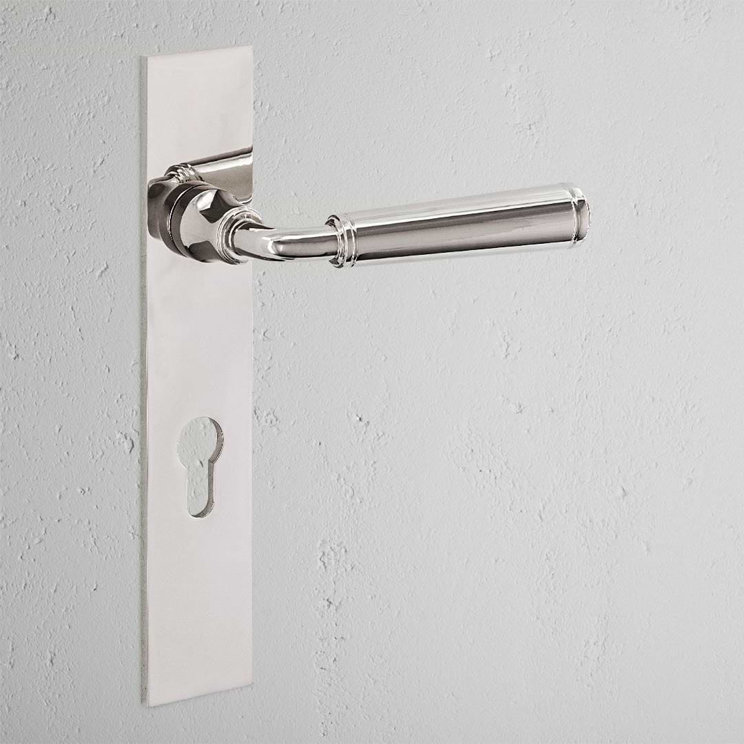 Digby Long Plate Sprung Door Handle & Euro Lock Polished Nickel Finish on White Background