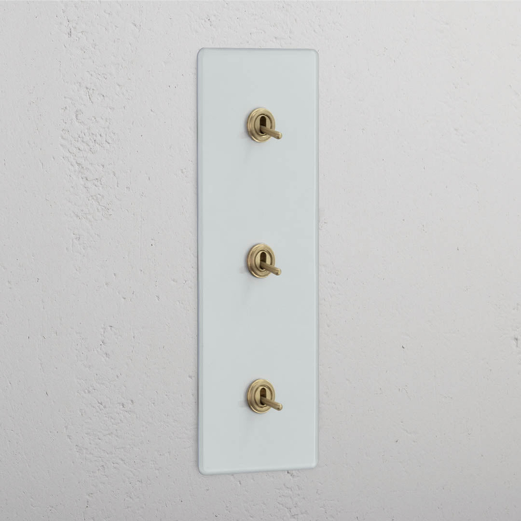 Vertical Triple Toggle Switch in Clear Antique Brass - User-friendly Light Control Tool