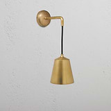 Antique brass hanging wall light with a antique solid brass shade