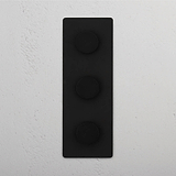 Adjustable Light Control with Vertical Bronze Triple Dimmer Switch on White Background