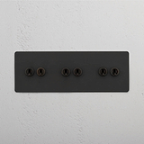 Bronze Triple Toggle Switch with 6 Positions - Sleek and Efficient Light Management on White Background