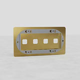 Four-Slot Switch Plate in Antique Brass - Vintage European Home Decor on White Background