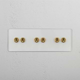 Six-Levers Triple Toggle Switch in Clear Antique Brass - Elegant Light Control Solution on White Background