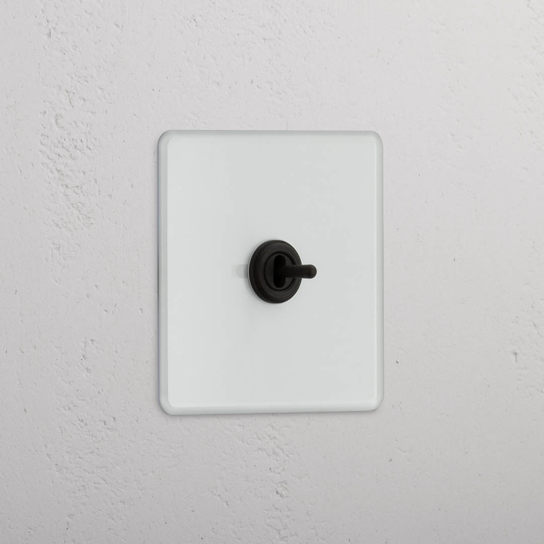 Central Single Toggle Switch in Clear Bronze - Efficient Light Control System