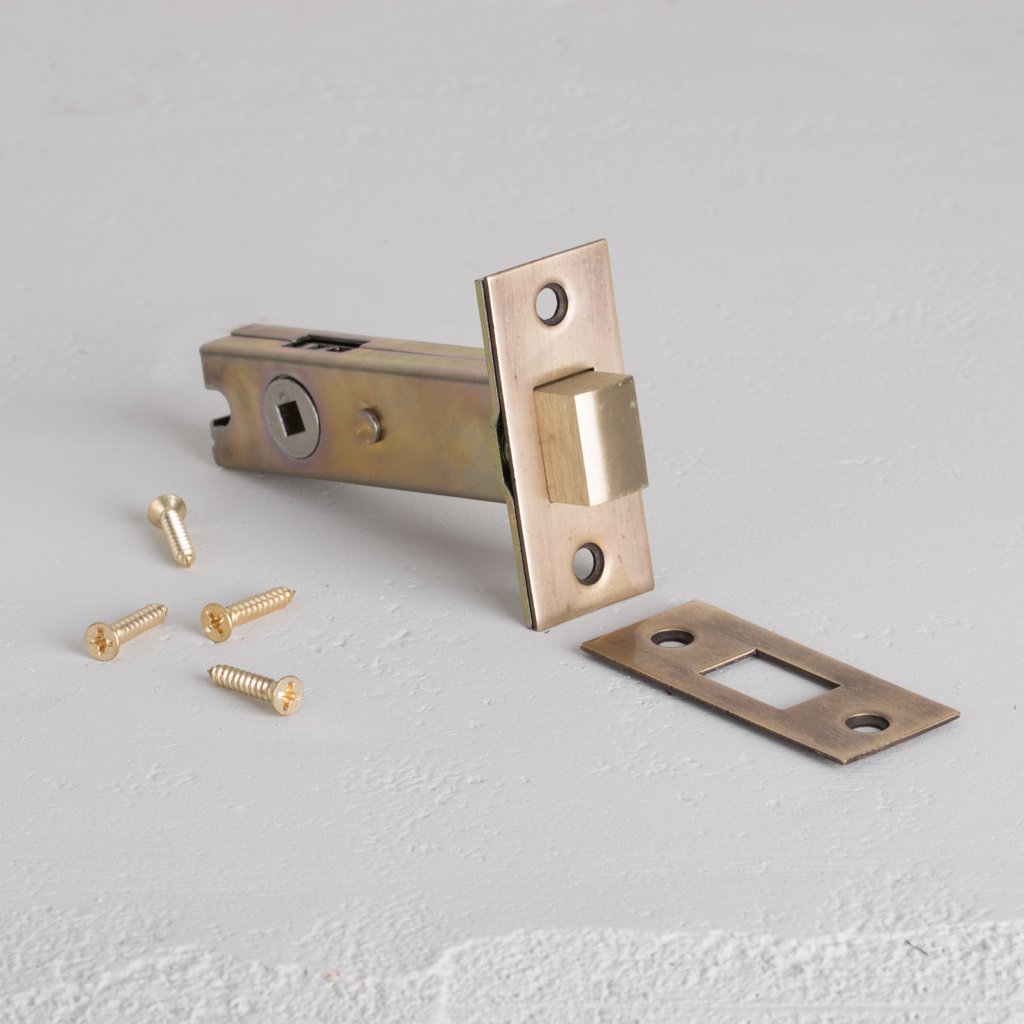Antique Brass Bathroom Lock 60mm on White Background