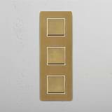 Easy-to-Control Vertical Triple Rocker Switch in Antique Brass White on White Background