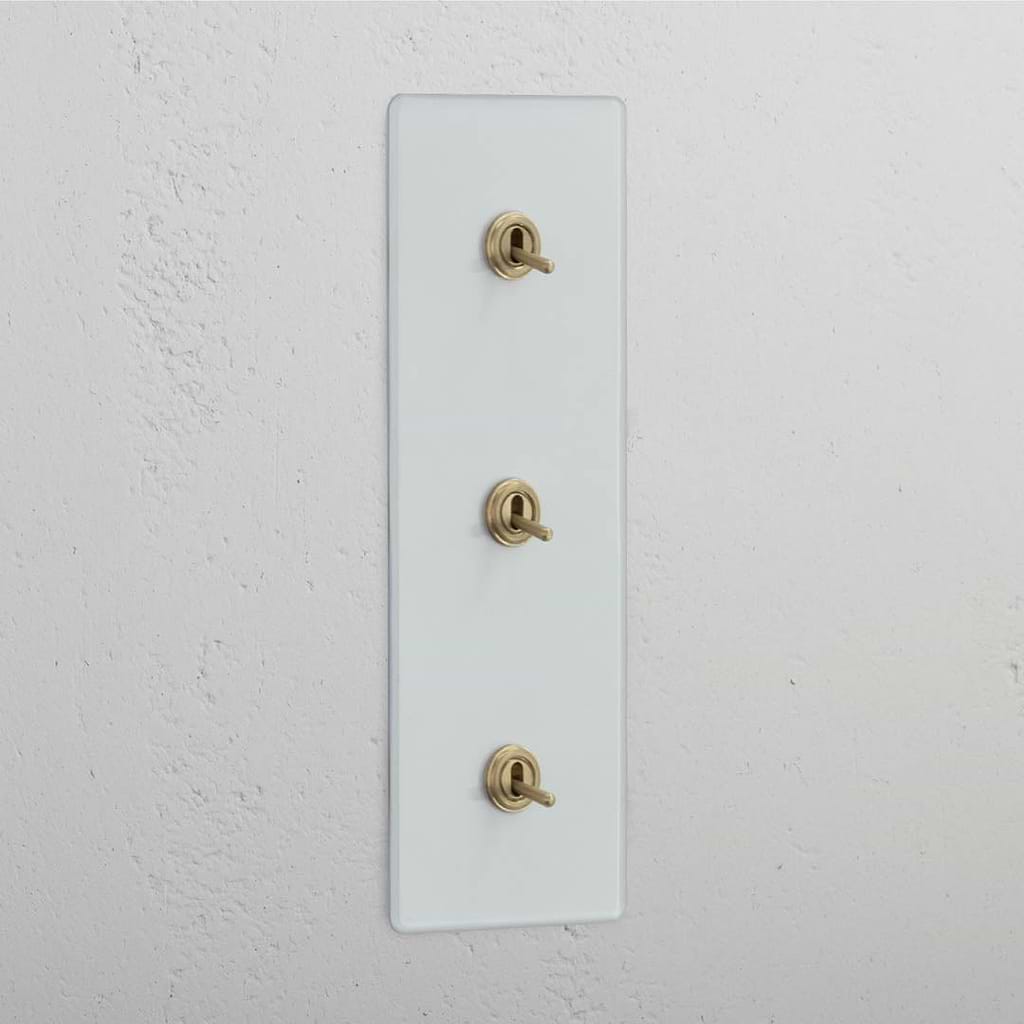 Vertical Triple Toggle Switch in Clear Antique Brass - User-friendly Light Control Tool