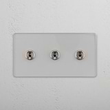 Functional Triple Toggle Switch in Clear Polished Nickel for Light Control on White Background