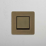 Antique Brass Black Single Rocker Switch with Retractive Function on White Background