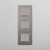 Vertical Six-Unit Rocker Switch in Polished Nickel White on White Background