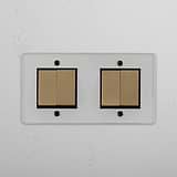 Elegant Double Rocker Switch with 4 Positions in Clear Antique Brass Black on White Background