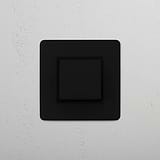 Retractive Rocker Switch in Bronze Black on White Background