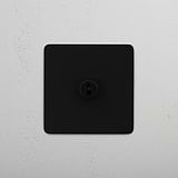 Central Bronze Single Toggle Switch - Perfect Solution for Light Control on White Background