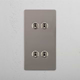 High Capacity Vertical Light Toggle Switch on White Background: Polished Nickel Double 4x Vertical Toggle Switch