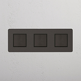 Seamless Light Control with Bronze Black Triple Rocker Switch on White Background