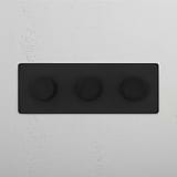 Bronze Triple Dimmer Switch - Modern Solution for Adjustable Light Control on White Background