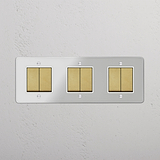 Comprehensive Light Management Tool: Six-Position Triple Rocker Switch in Clear Antique Brass White on White Background