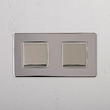 Dual Light Control Switch: Polished Nickel White Double 2x Rocker Switch on White Background