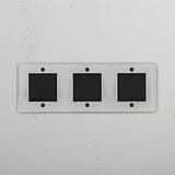 Comprehensive Triple Rocker Switch in Clear Bronze Black for Light Management on White Background