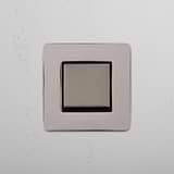 Retractive Light Control Switch on White Background: Polished Nickel Black Single Rocker Switch (Ret)