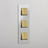 Vertical Six-Position Triple Rocker Switch in Clear Antique Brass White - Superior Light Management Solution