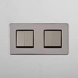 High Capacity Quad Control Light Switch: Four-Way Rocker Switch in Polished Nickel Black on White Background