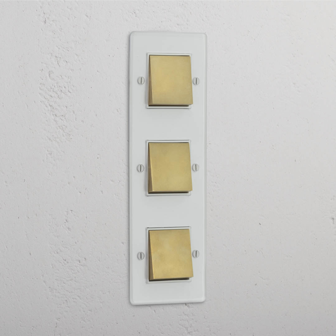 Vertical Triple Rocker Switch in Clear Antique Brass White - Efficient Light Control Tool