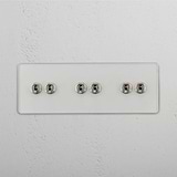Multi-Level Six-Position Triple Toggle Switch in Clear Polished Nickel - High-Quality Light Control Accessory on White Background