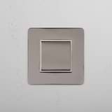 Centre-Position Single Rocker Switch in Polished Nickel White on White Background