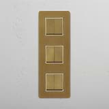Versatile Triple Vertical Rocker Switch in Antique Brass White for Easy Operation on White Background