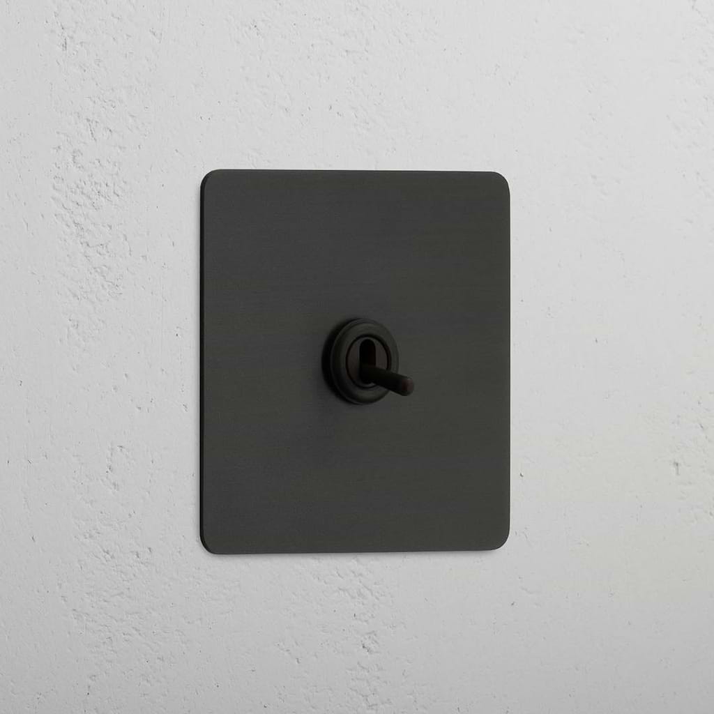 Single Toggle Switch in Bronze - Sleek and Stylish Home Detail