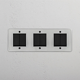 Modern Six-Position Triple Rocker Switch in Clear Bronze Black for Light Control on White Background