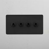Robust Double Toggle Switch in Bronze with 4 Levers on White Background