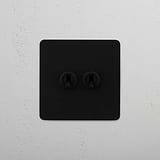Double Toggle Switch in Bronze with 2 Levers on White Background